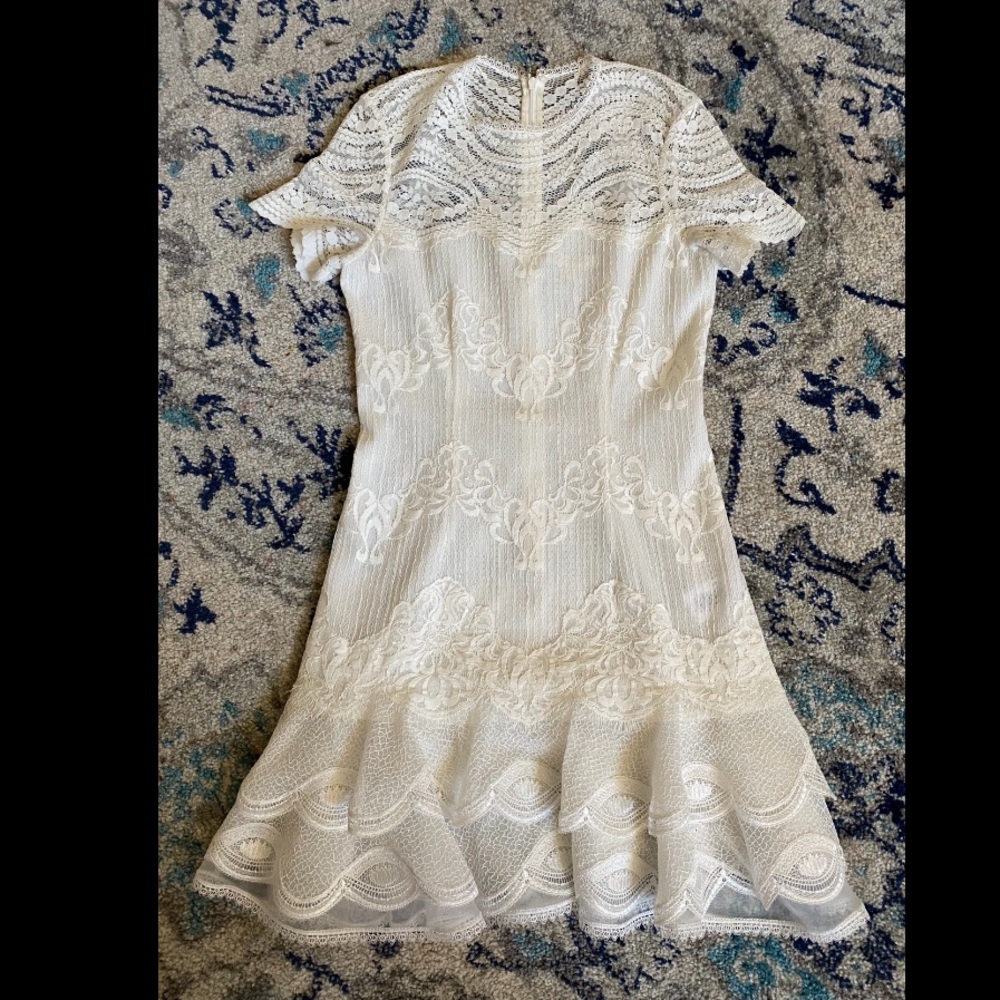 Jonathan Simakhai white dress